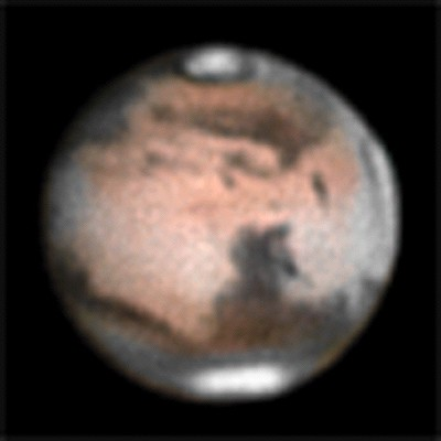 MARS FROM SPACE SHOWING POLAR CAPS AND FAMOUS DARK REGIONS