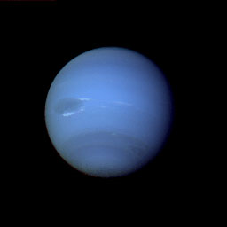 PLANET NEPTURNE FROM SPACE SHOWING LARGE STORM SYSTEM