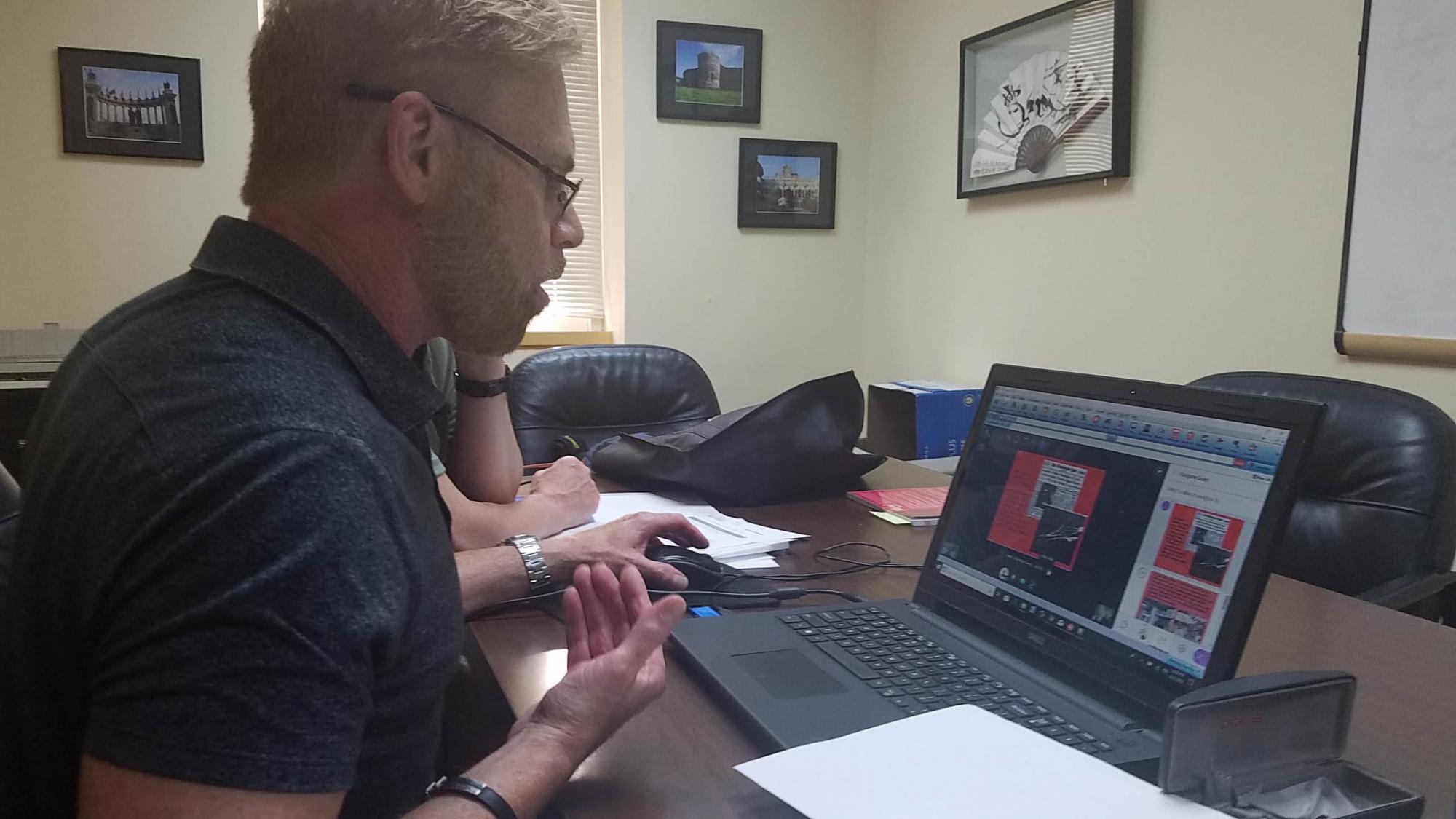 ELI teacher giving his online class to Peruvian students