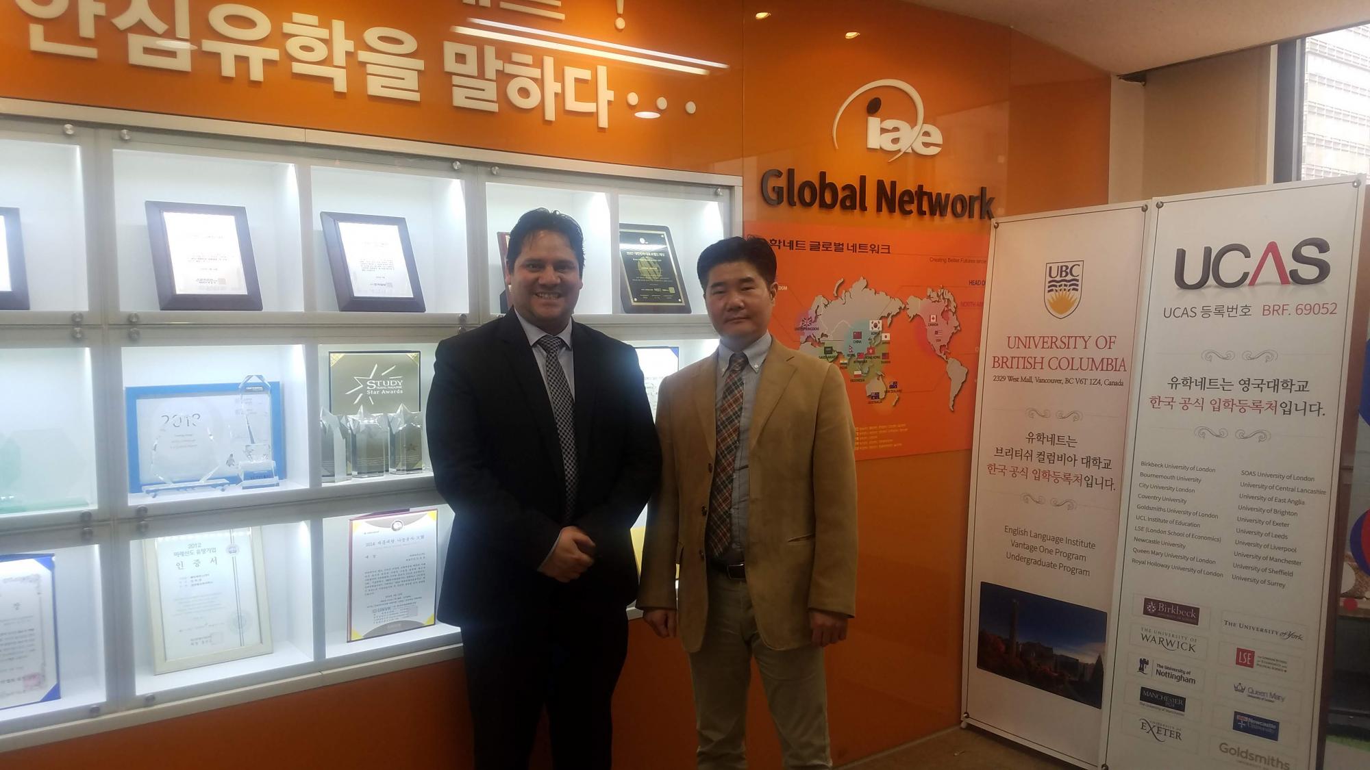 ELI Director with Korean representative at an office standing